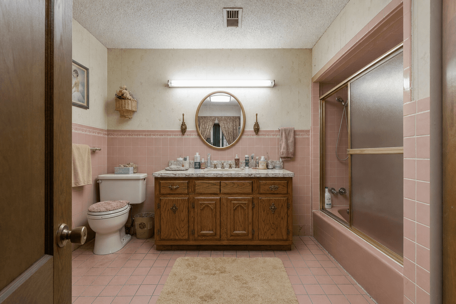 Dated bathroom before Verax Group remodel